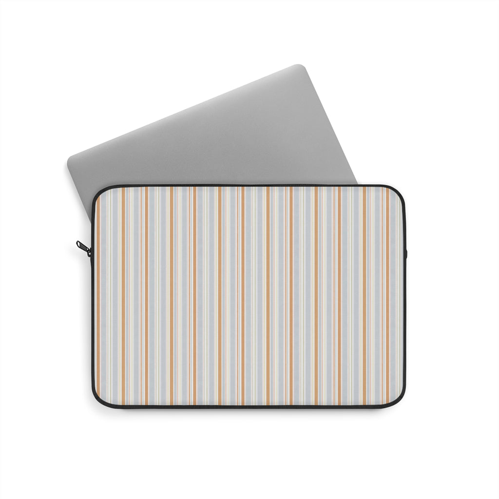 Laptop sleeve with sky-striped fabric, black zipper trim and rounded edge.
