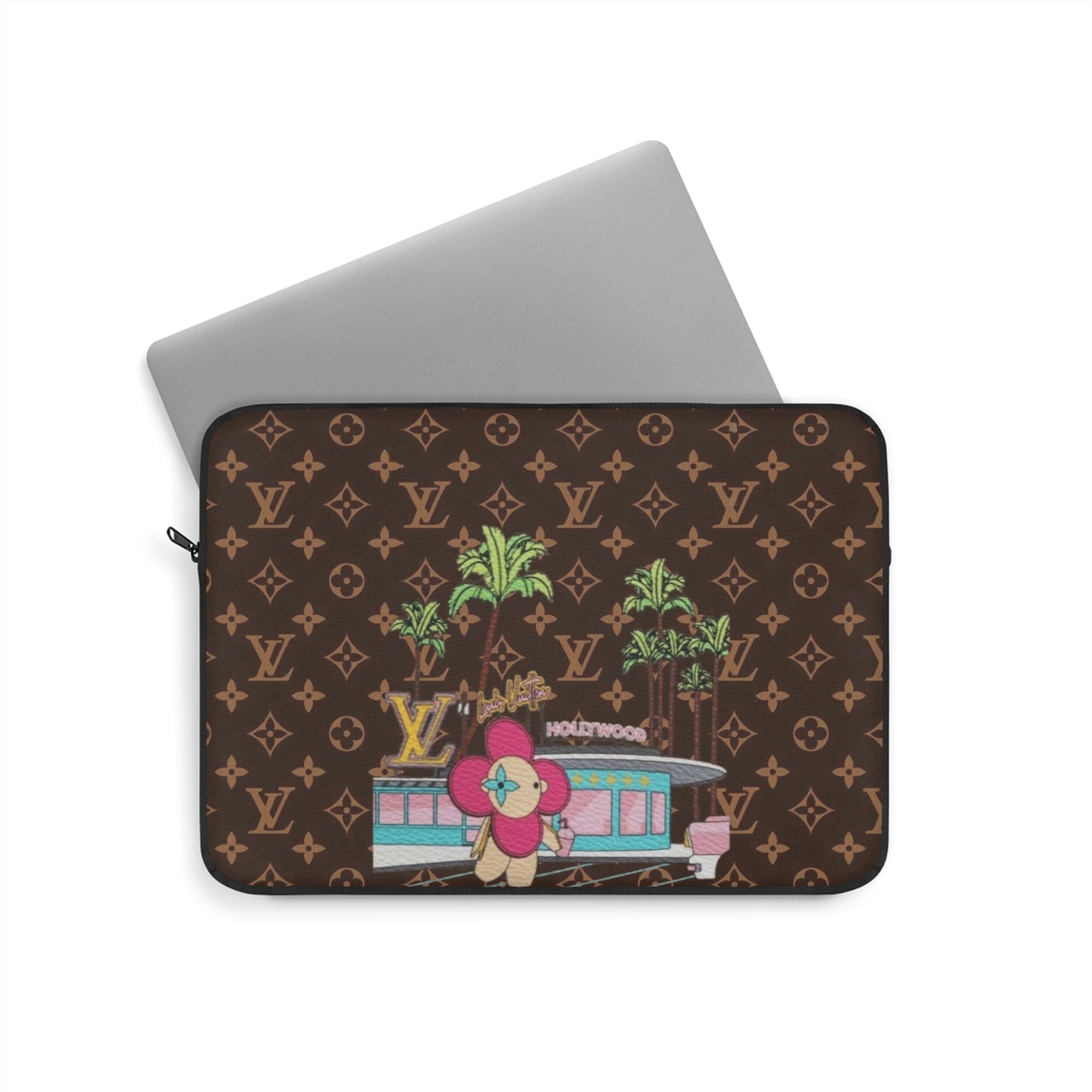 Brown laptop sleeve with zip closure and colorful animal and plants graphic