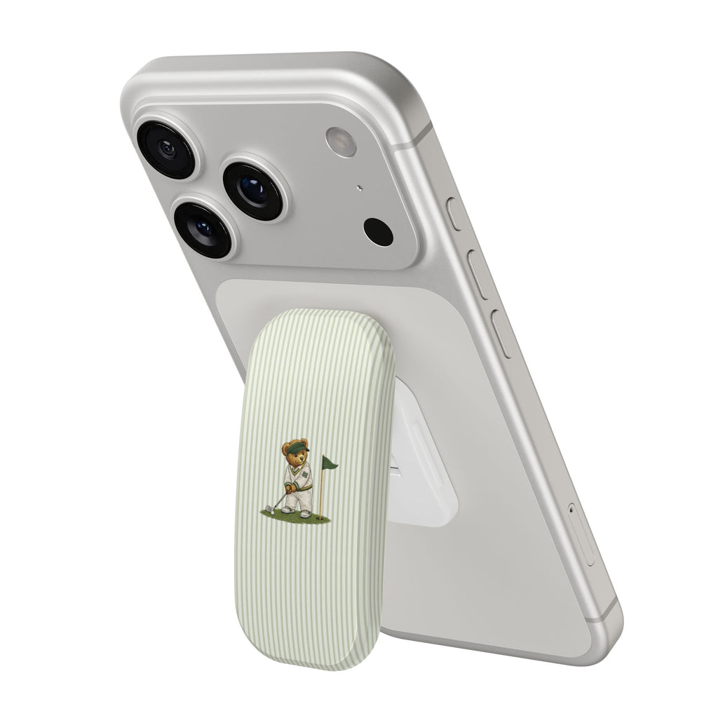 Silver phone case edge with green striped teddy bear golfer grip