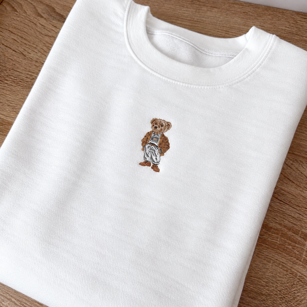 THE EMBROIDERED MINI TEDDY BEAR WHITE CREWNECK SWEATSHIRT