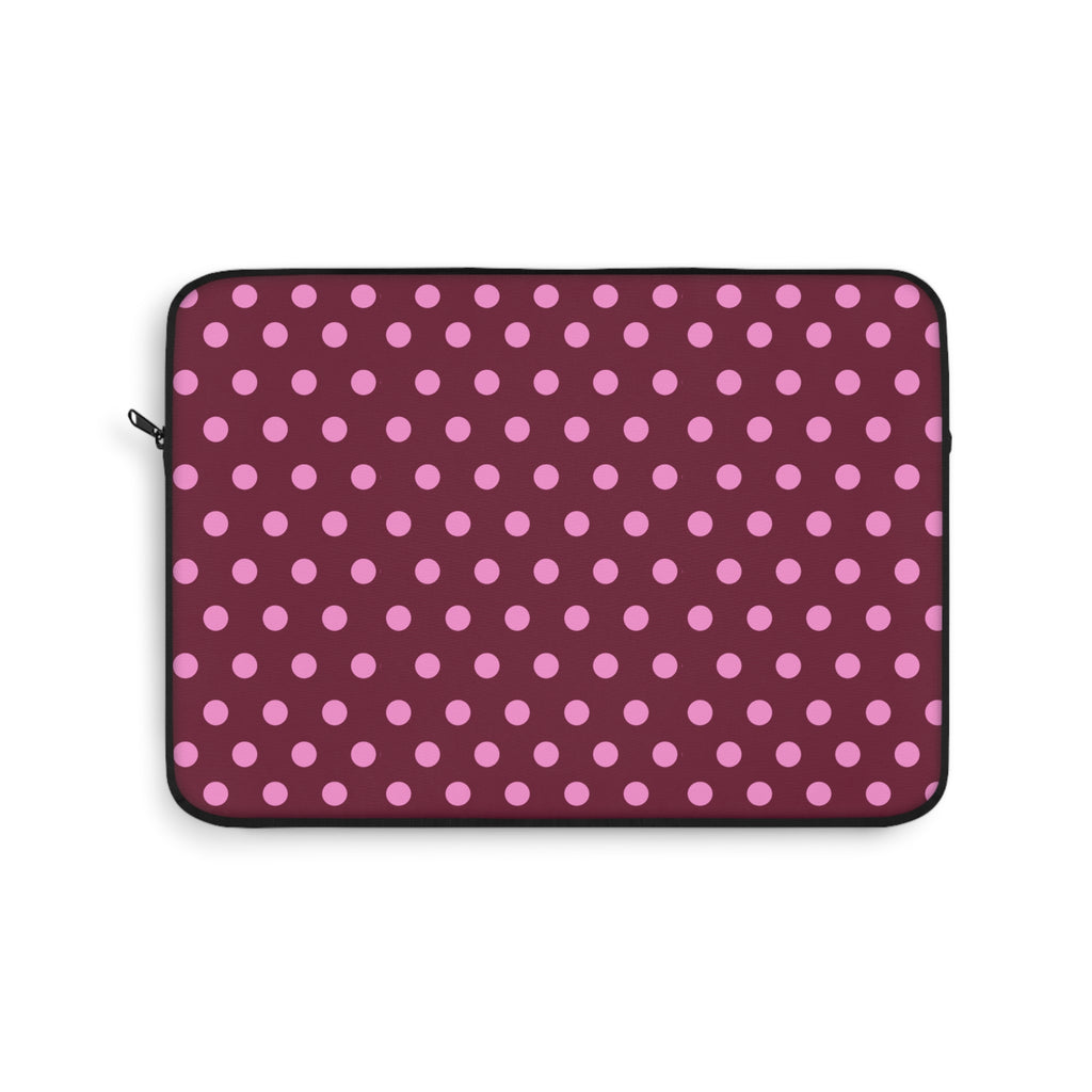 Raspberry polka dot neoprene sleeve with zip closure and black edging