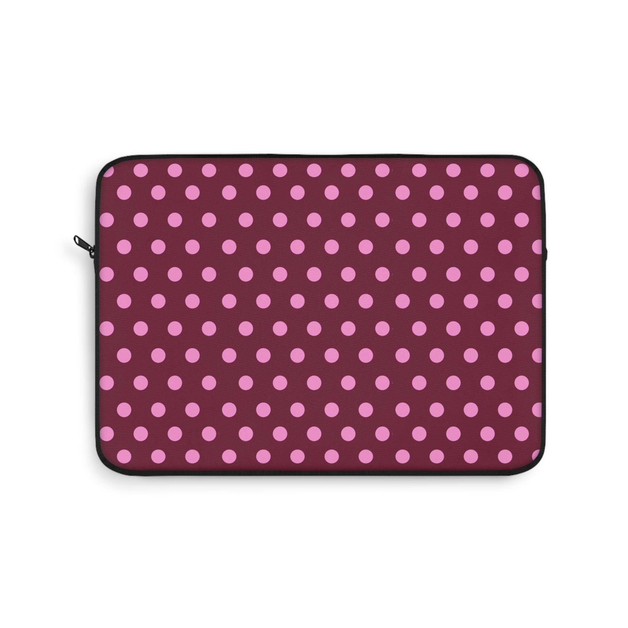 Raspberry polka dot neoprene sleeve with zip closure and black edging