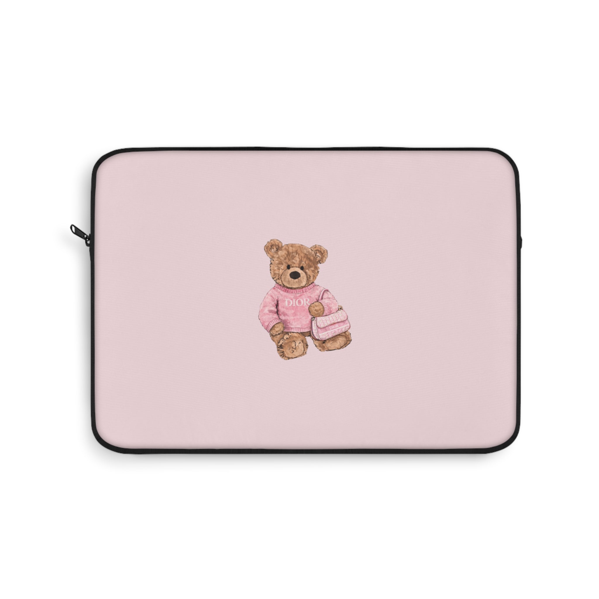 Pink neoprene device sleeve with centered teddy bear patch and black trim