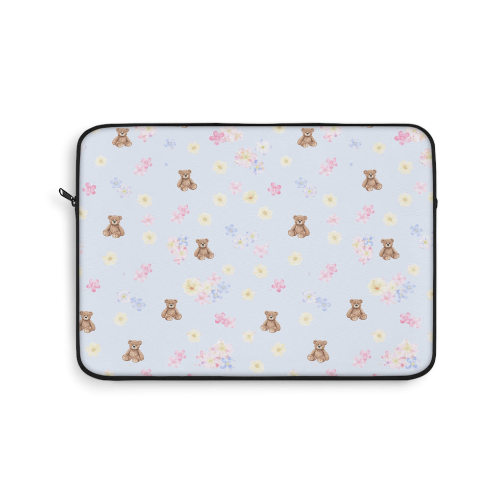 Tablet sleeve, light blue with teddy bears and flowers pattern, black zipper trim.