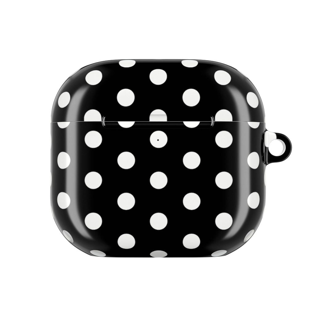 AirPods case front, black shell with white polka dots and side loop