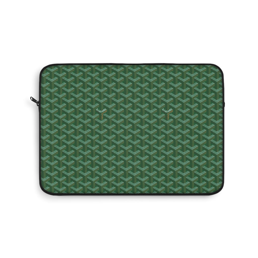 Green Goyard-style tablet sleeve with geometric pattern and zip closure