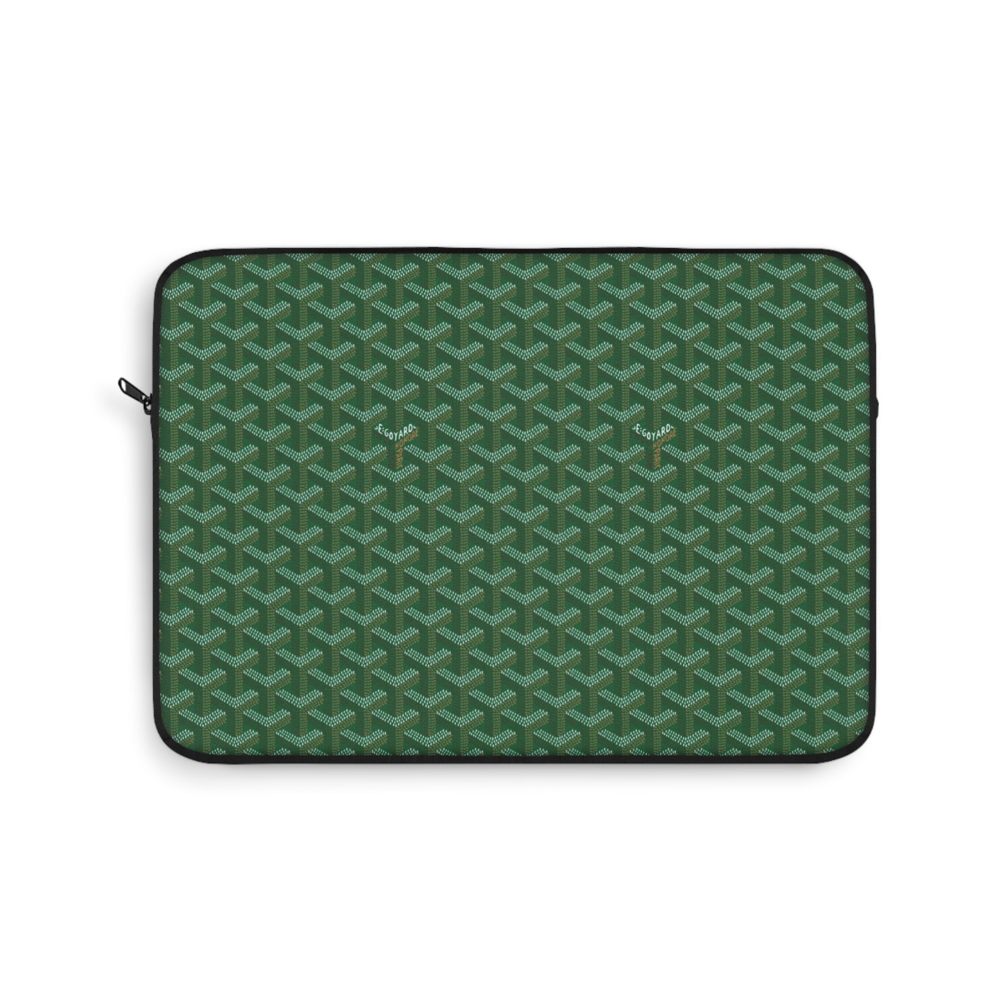 Green Goyard-style tablet sleeve with geometric pattern and zip closure