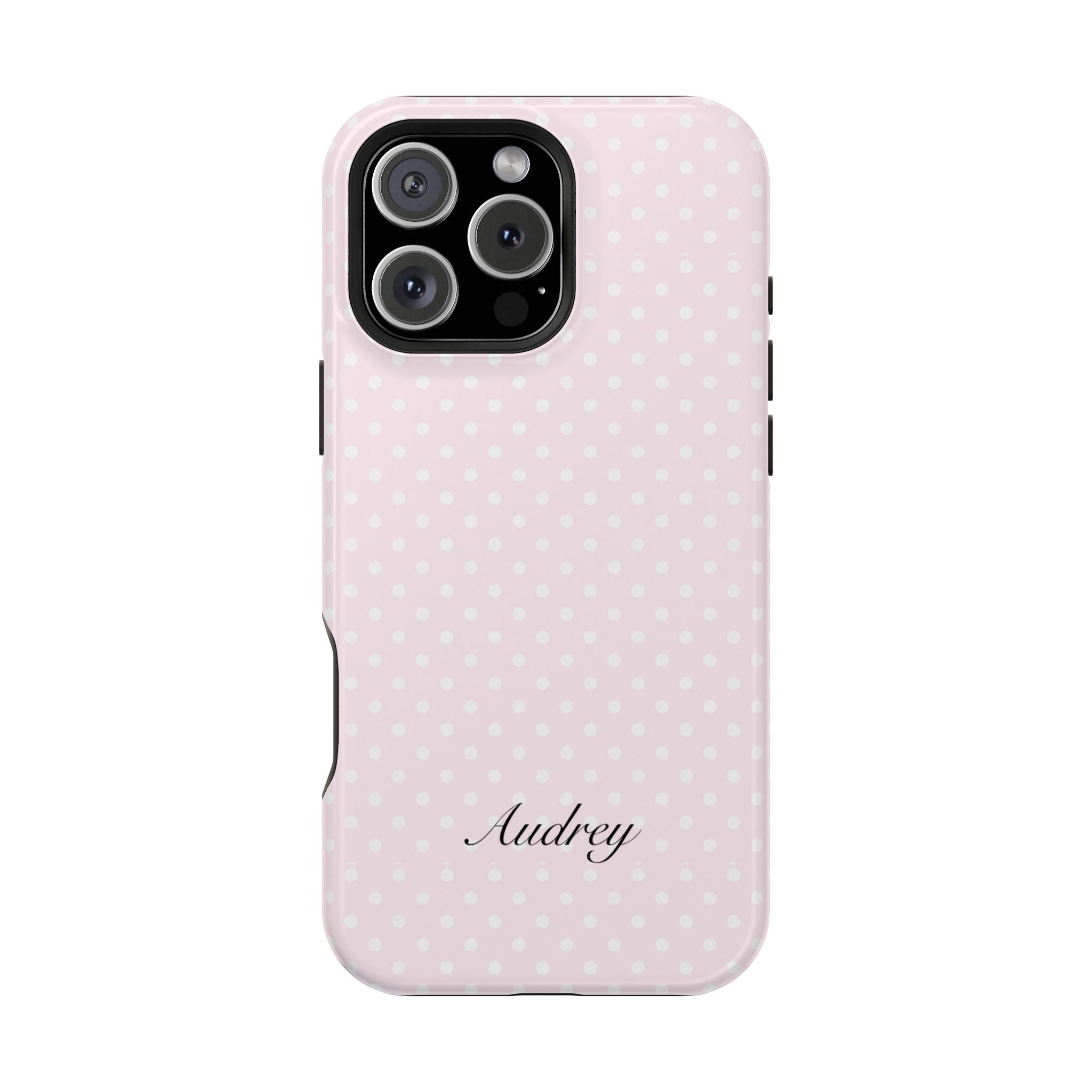Pink polka dot phone case with cursive 'Audrey' on back and camera module