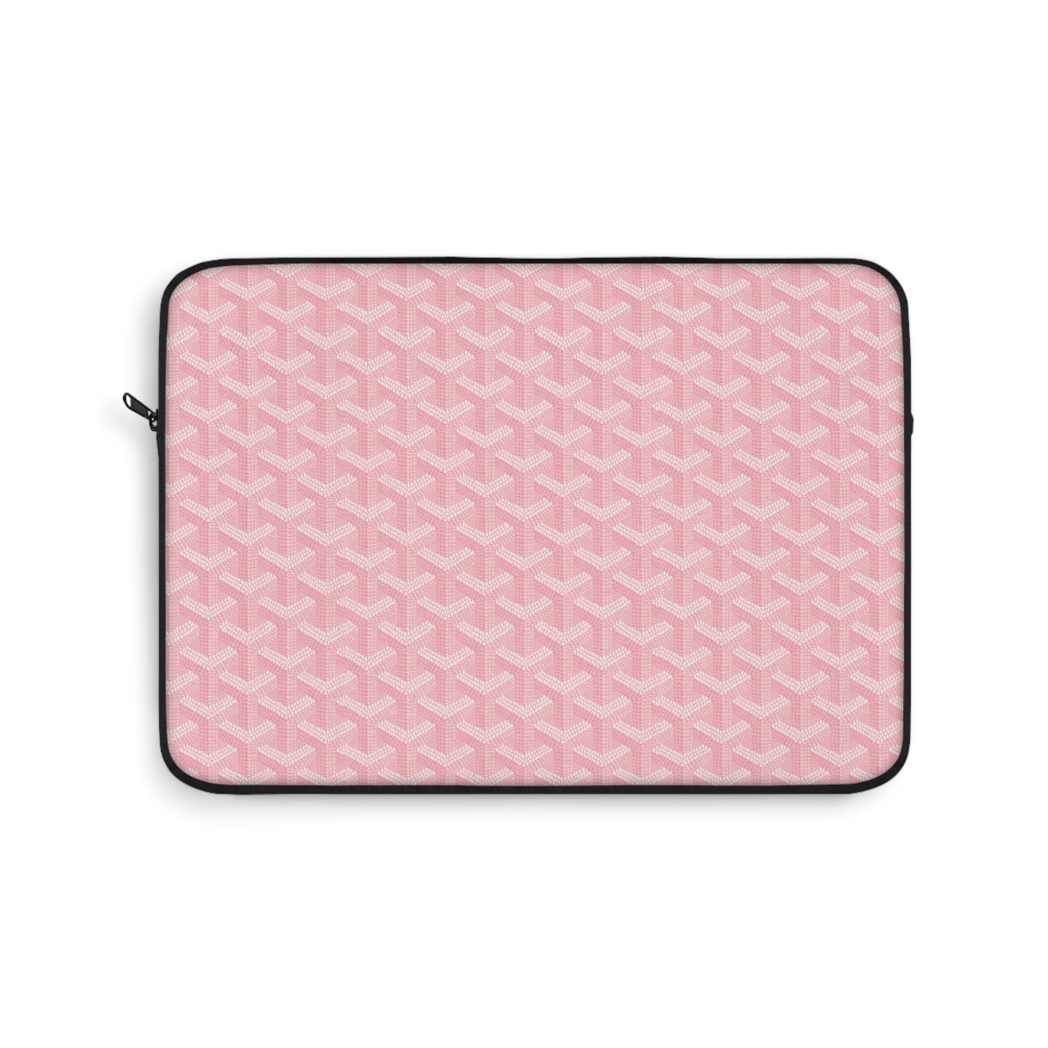 Pink tablet sleeve with geometric pattern and black zipper trim