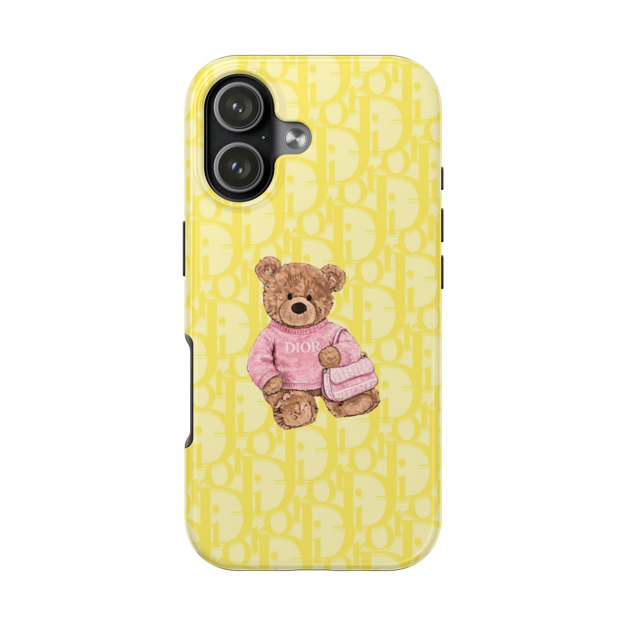 Yellow Dior teddy bear phone case with pink sweatshirt teddy and small purse, angled view