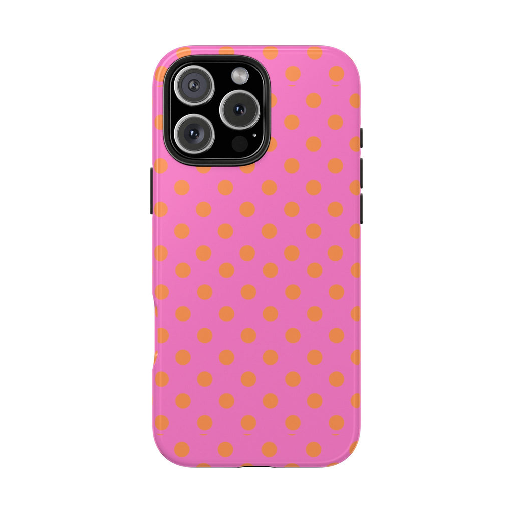 Pink phone case with orange polka dots, smooth back with camera lens cutout