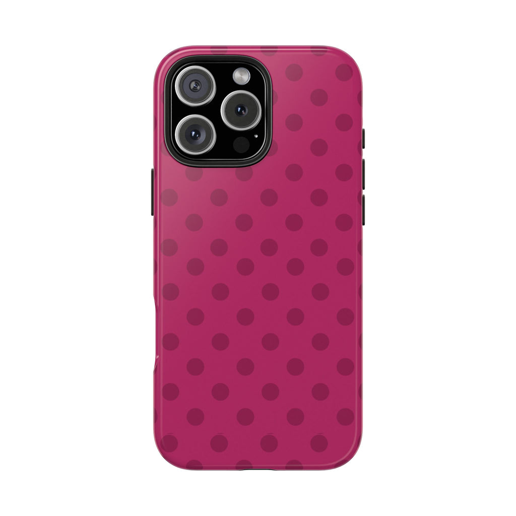 Cranberry pink glossy phone case with dark polka dots and rear camera openings