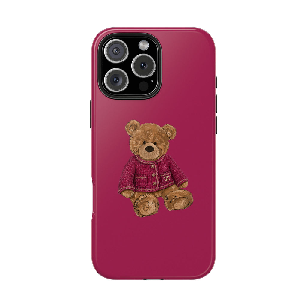 Raspberry pink phone case with teddy bear applique wearing maroon jacket, triple camera