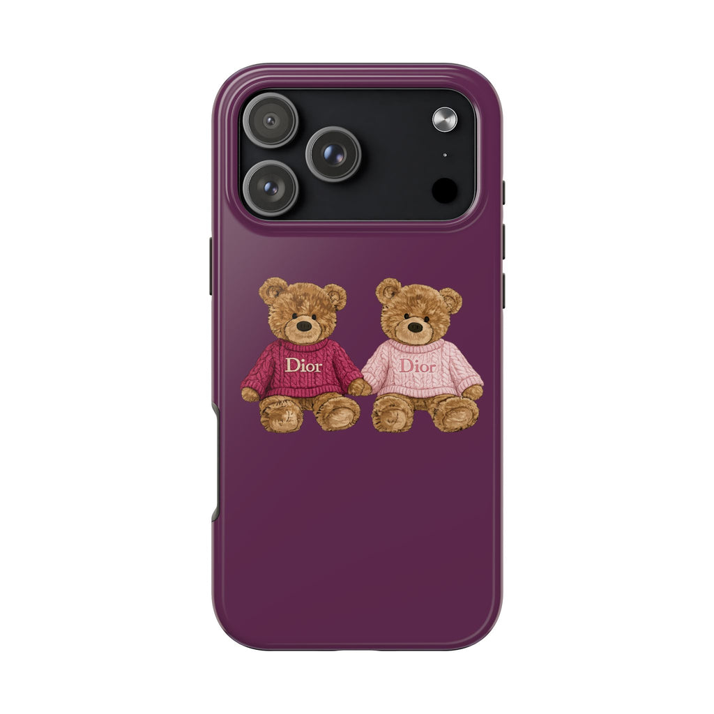 Purple phone case with two teddy bears in pink and white Dior sweaters, camera cutout