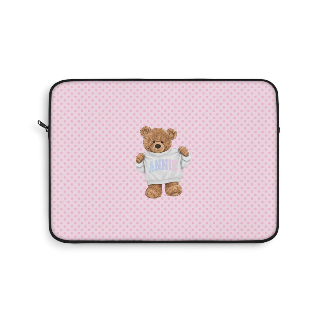 Pink polka dot laptop sleeve with teddy bear holding shirt name graphic, black border