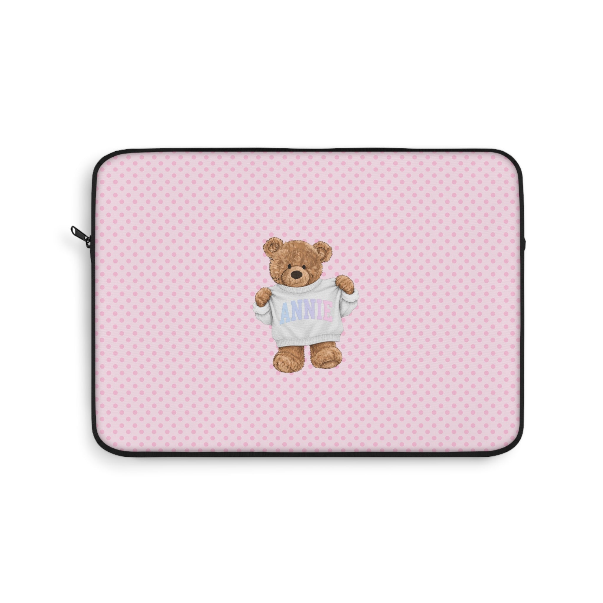 Pink polka dot laptop sleeve with teddy bear holding shirt name graphic, black border