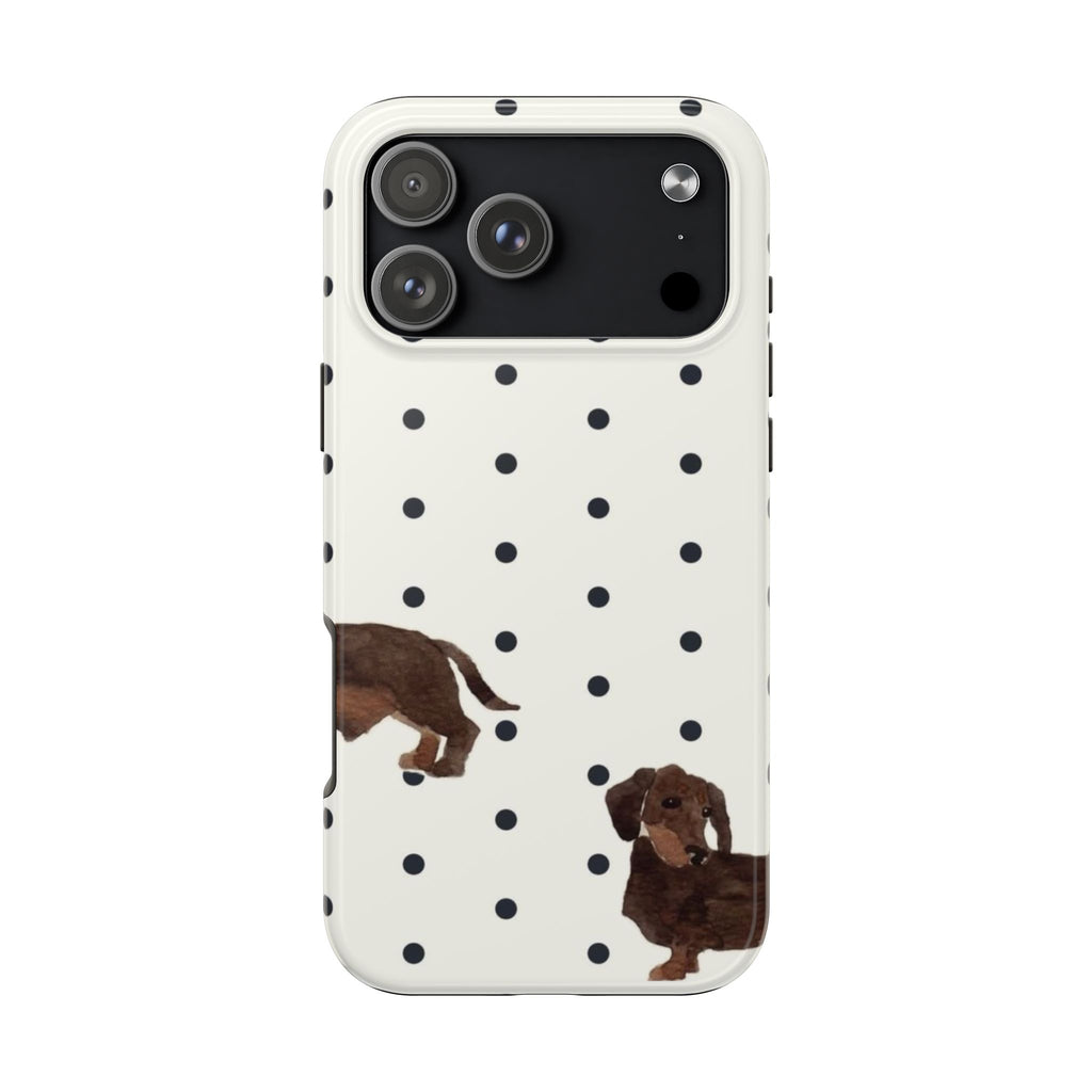 White phone case with black polka dots and dachshund dog graphic, black camera area