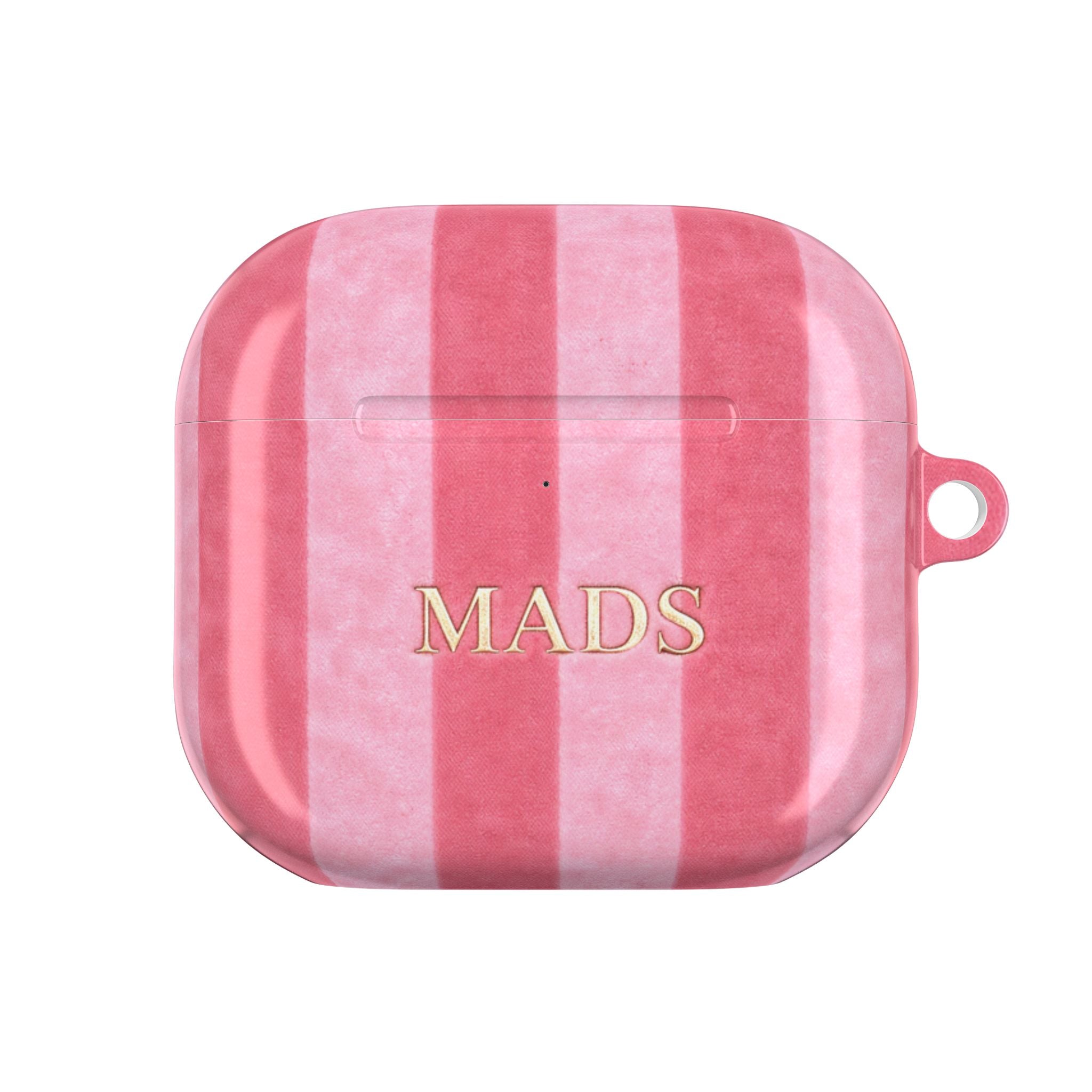 Pink velvet AirPods case with vertical plaid stripes and “MADS” print, front view.