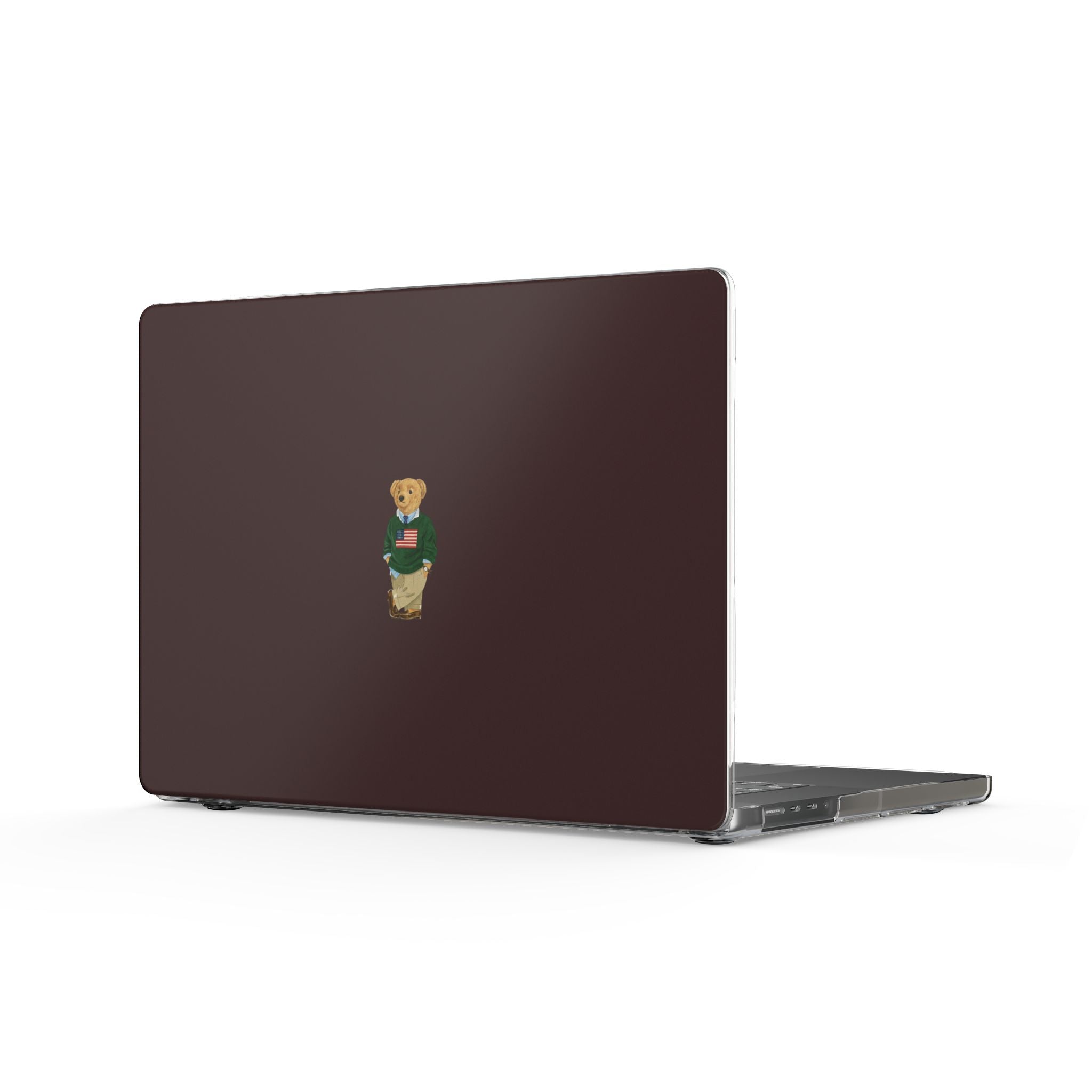 Brown MacBook hard case cover with small teddy bear patch on back