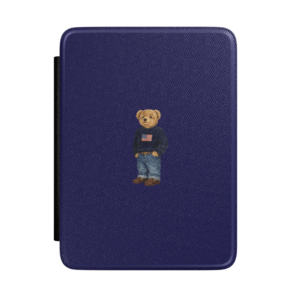 Navy hardcover Kindle case with small teddy bear wearing flag-themed shirt