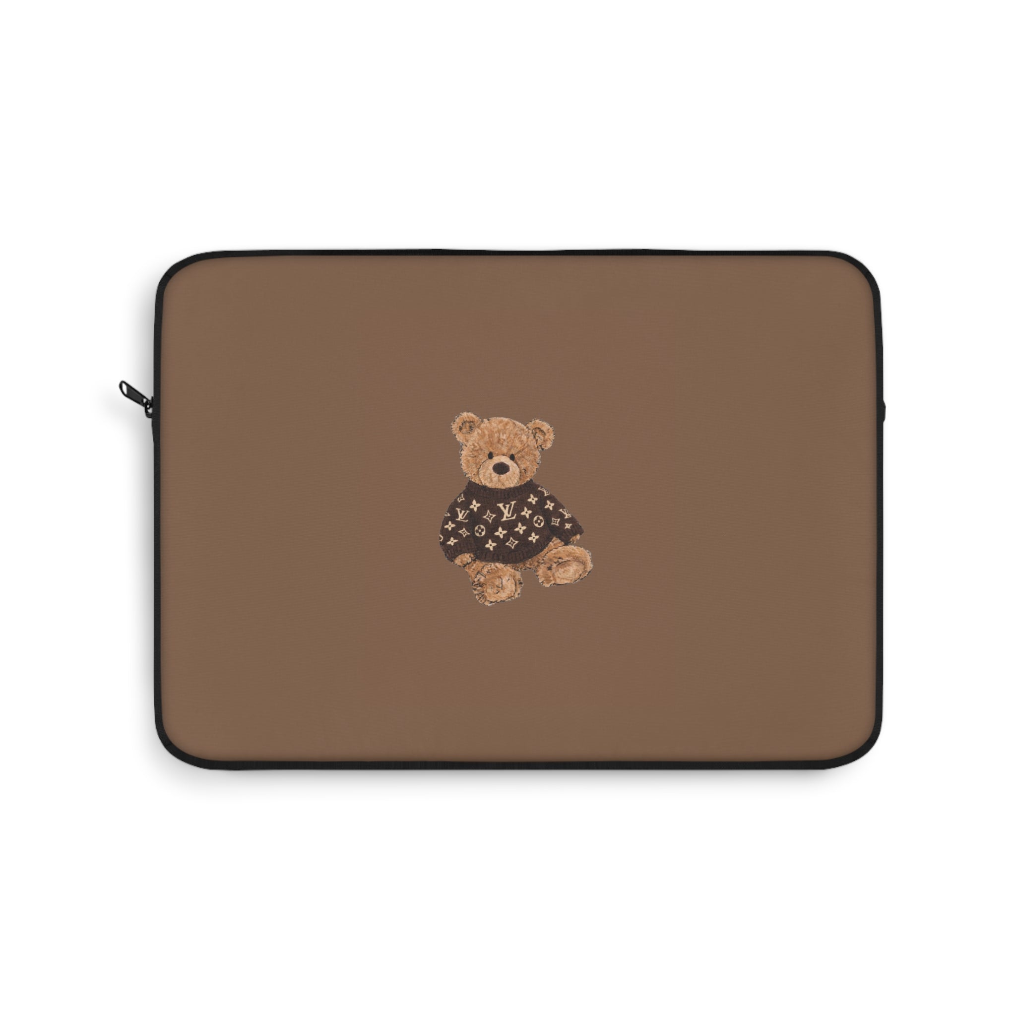 Brown laptop sleeve with teddy bear patch on the front and black trim