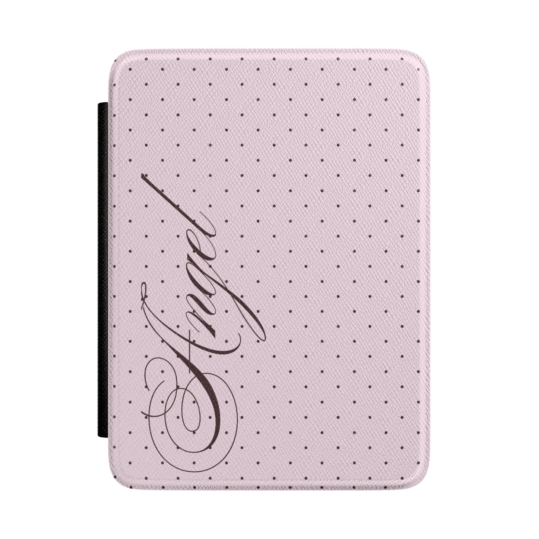 Pink hardcover kindle case with black polka dots and cursive angel graphic