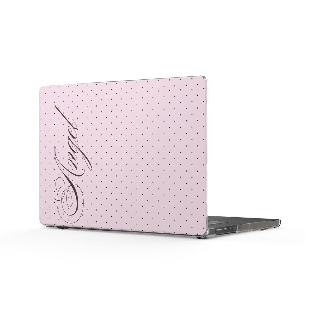 Pink polka dot laptop cover with coquette-style script, fitted corners and open cutout.