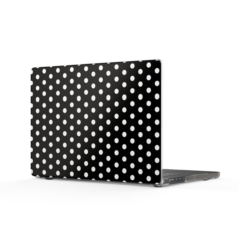 Black-and-white polka dot MacBook cover with clear edges