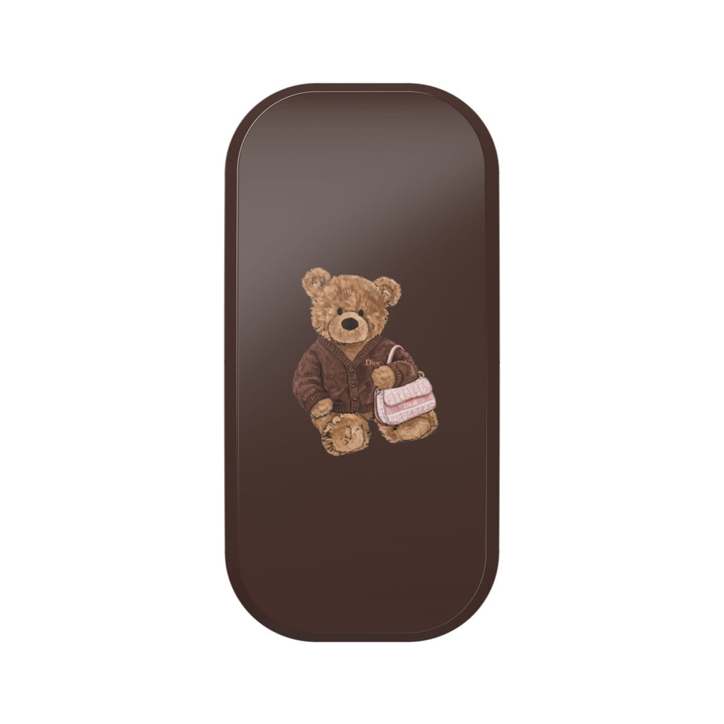 Brown phone grip with teddy bear patch on back