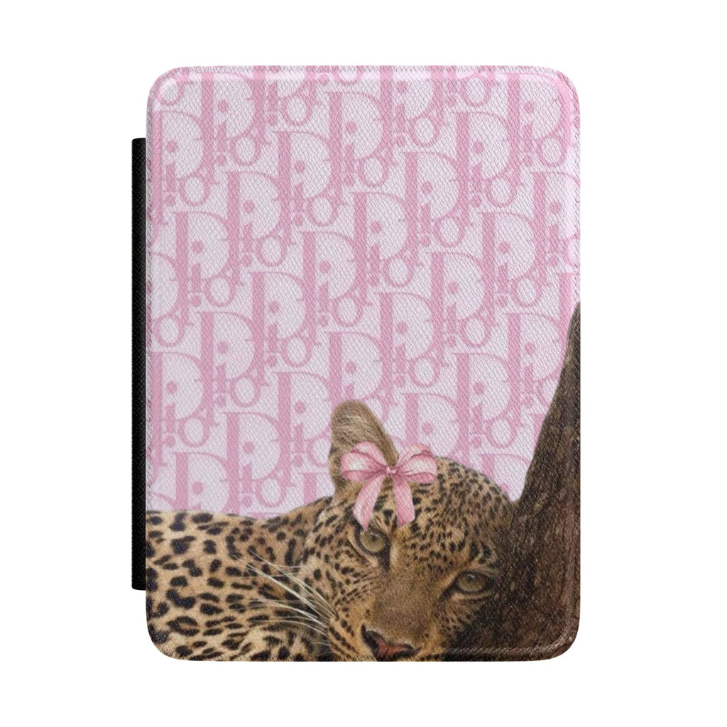 Pink hardcover Kindle case with Dior monogram pattern and leopard cheetah face detail
