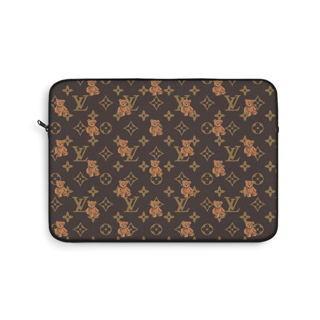 Laptop sleeve with dark brown LV monogram fabric and repeating teddy bear motif, zip closure