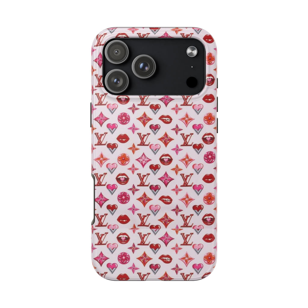 Pink LV monogram phone case with lips, hearts, and flower motifs; camera cutouts