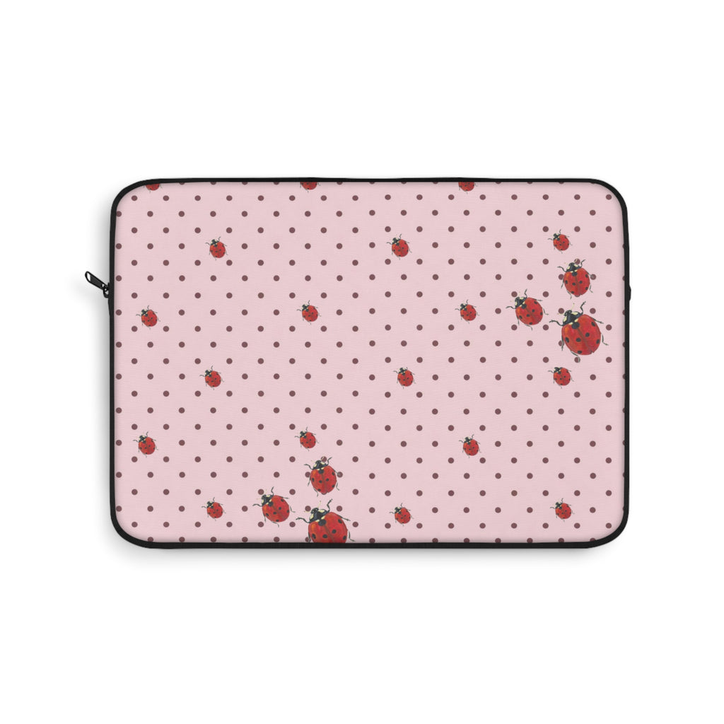 Pink polka dot sleeve with ladybug print, zippered case with rounded corners