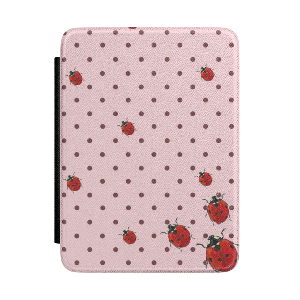 Pink hardcover Kindle case with black polka dots and red ladybug pattern