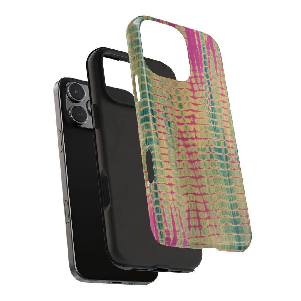 Phone case in green and magenta tie-dye, angled back with camera openings