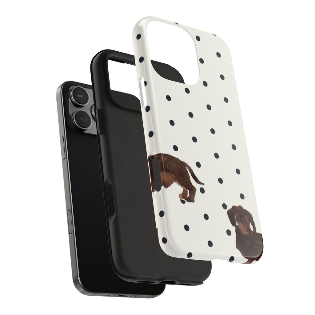 Dachshund polka-dot phone case in white, shown beside a plain black case