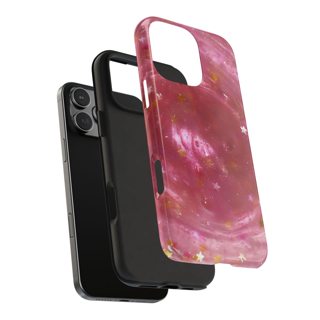 Pink galaxy phone case with starry print, side cutouts and raised camera area