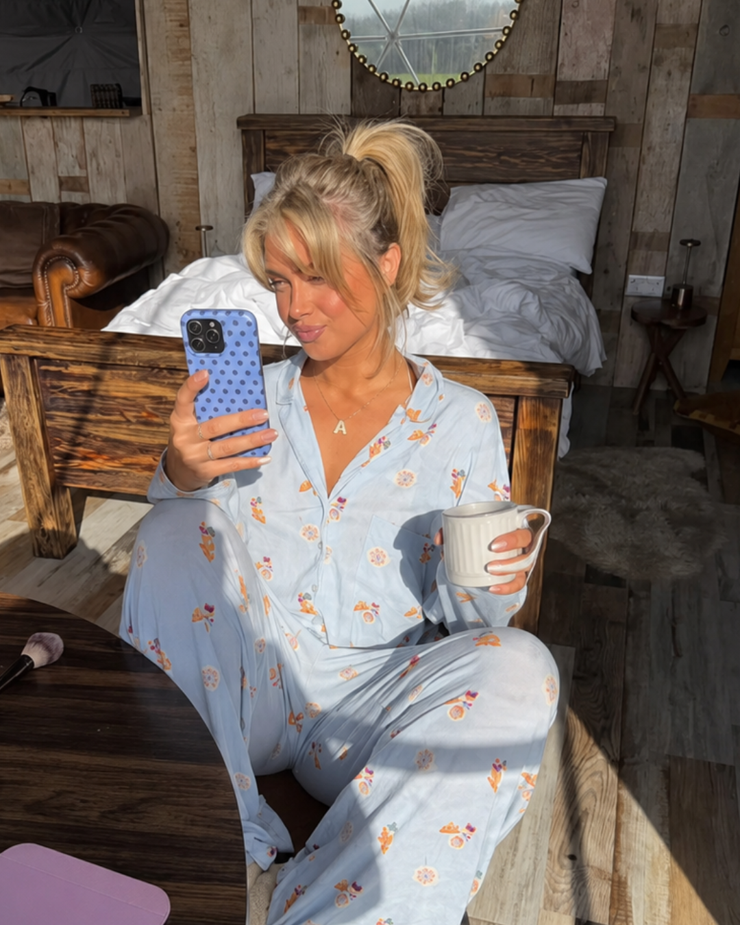 Blue phone case with dark polka dots, snug grip for handset back