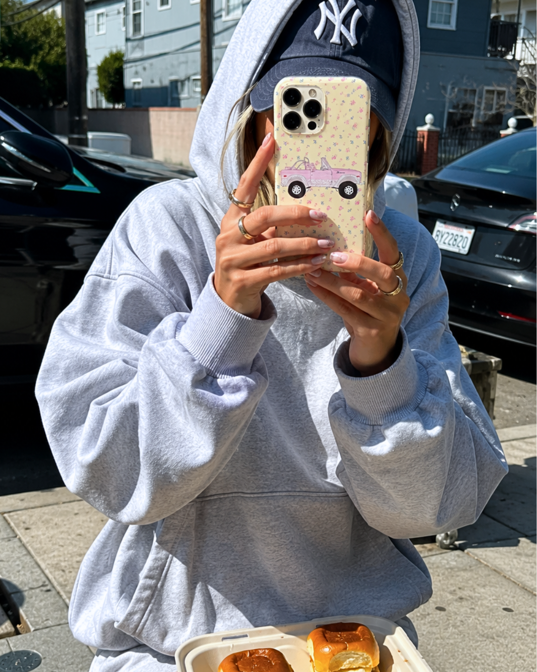 Yellow and pink ditsy floral phone case with vintage bronco graphic and camera cutouts