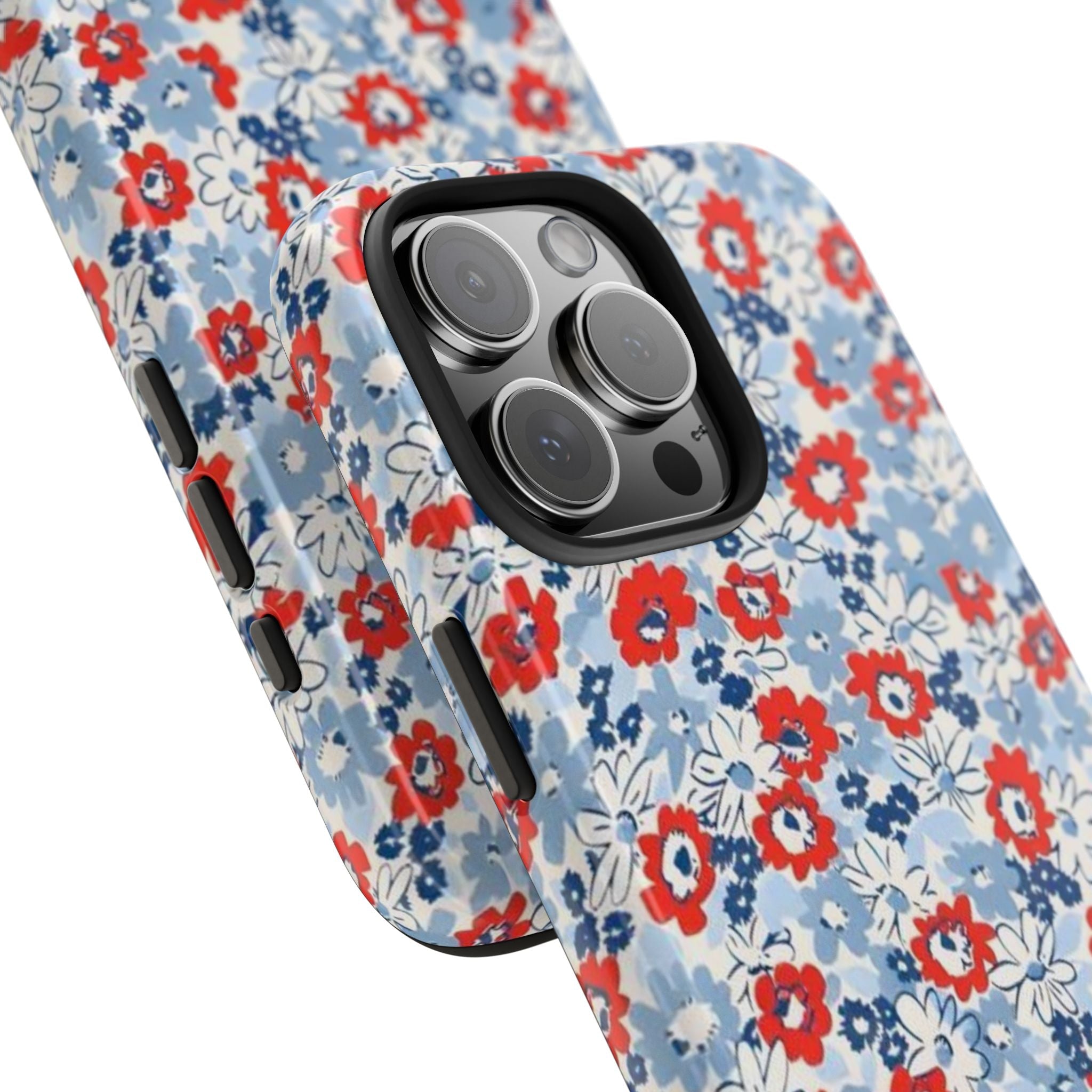 Light blue floral phone case with red and white flowers; raised camera and side buttons
