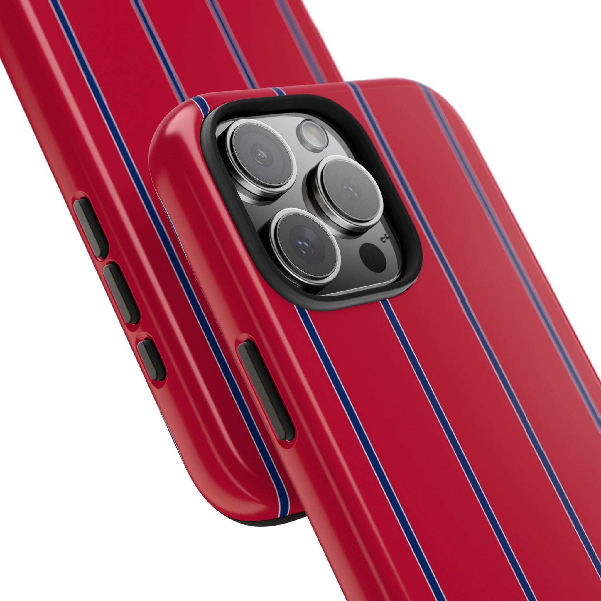 Close-up of red phone case with blue vertical stripes and raised camera-protecting bezel