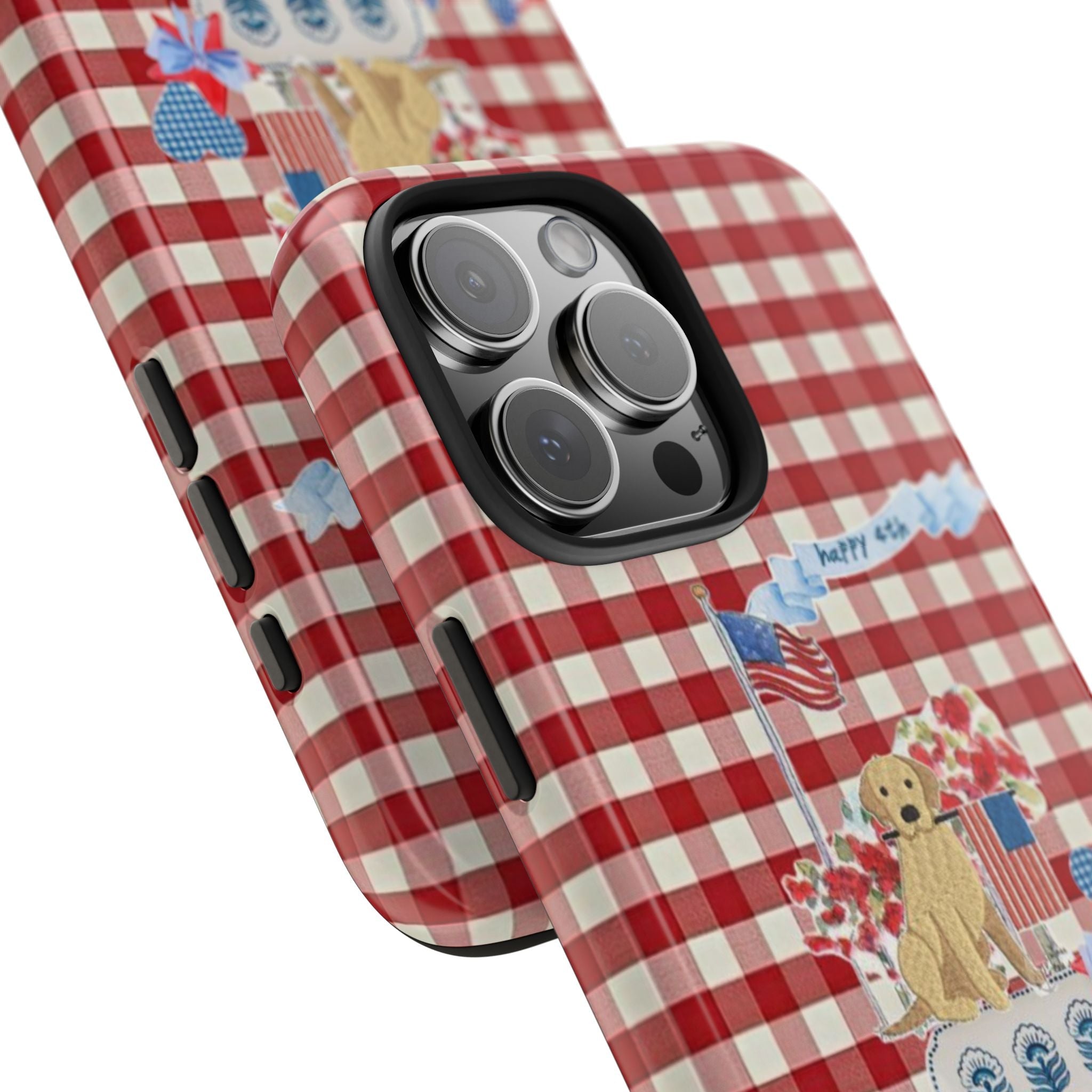 Angled view of red gingham phone case with camera cutouts and golden retriever graphic