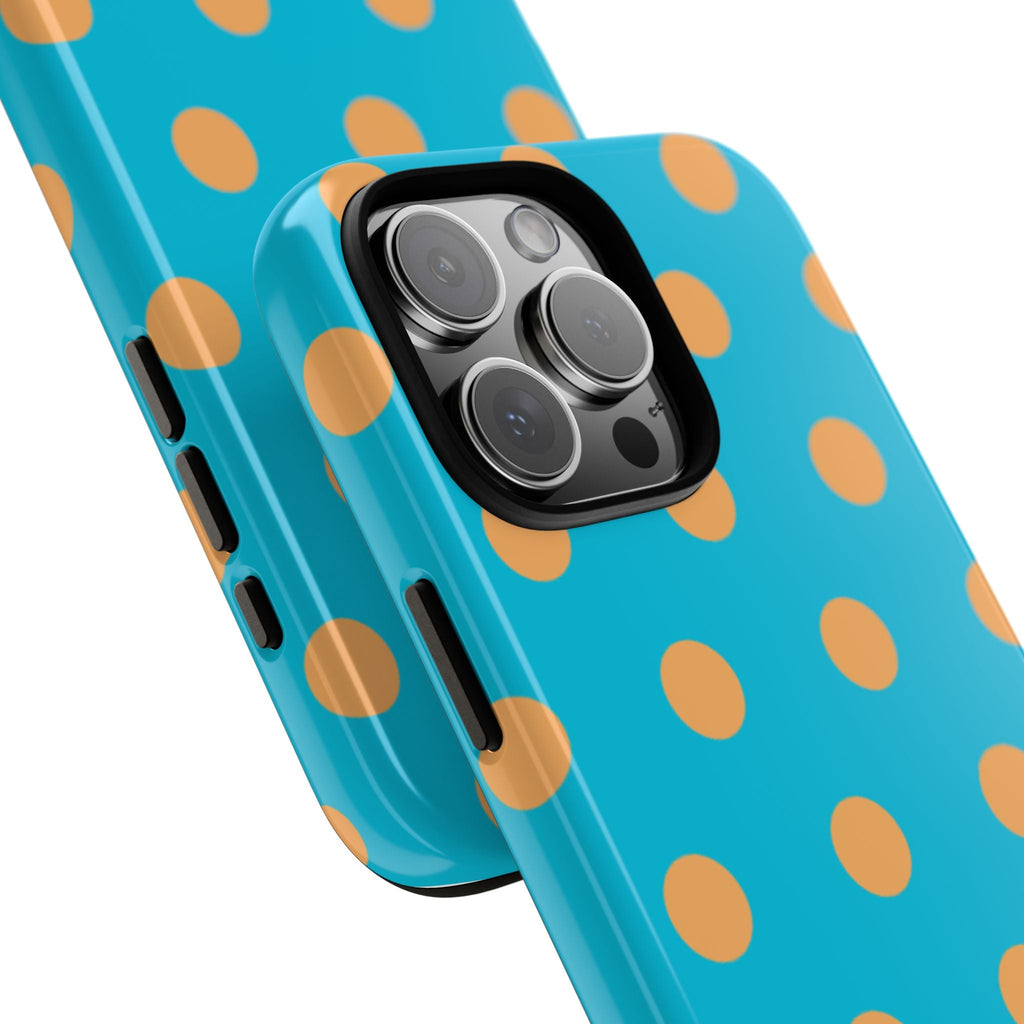 Aqua polka-dot phone case with orange dots; side button cutouts visible