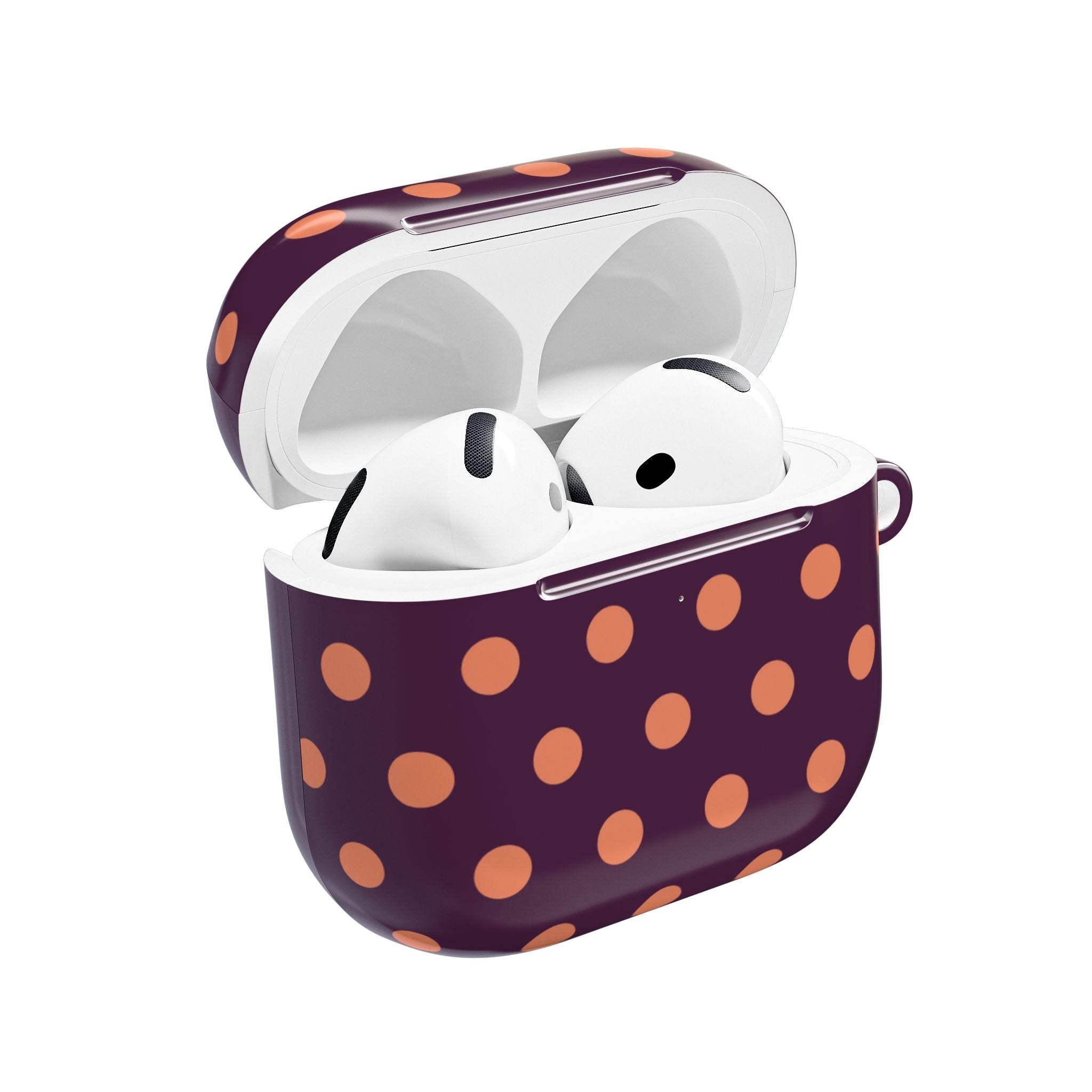 Aubergine AirPods case with orange polka dots, open lid showing earbuds
