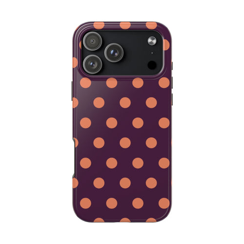 Aubergine phone case with orange polka dots and rear camera cutouts