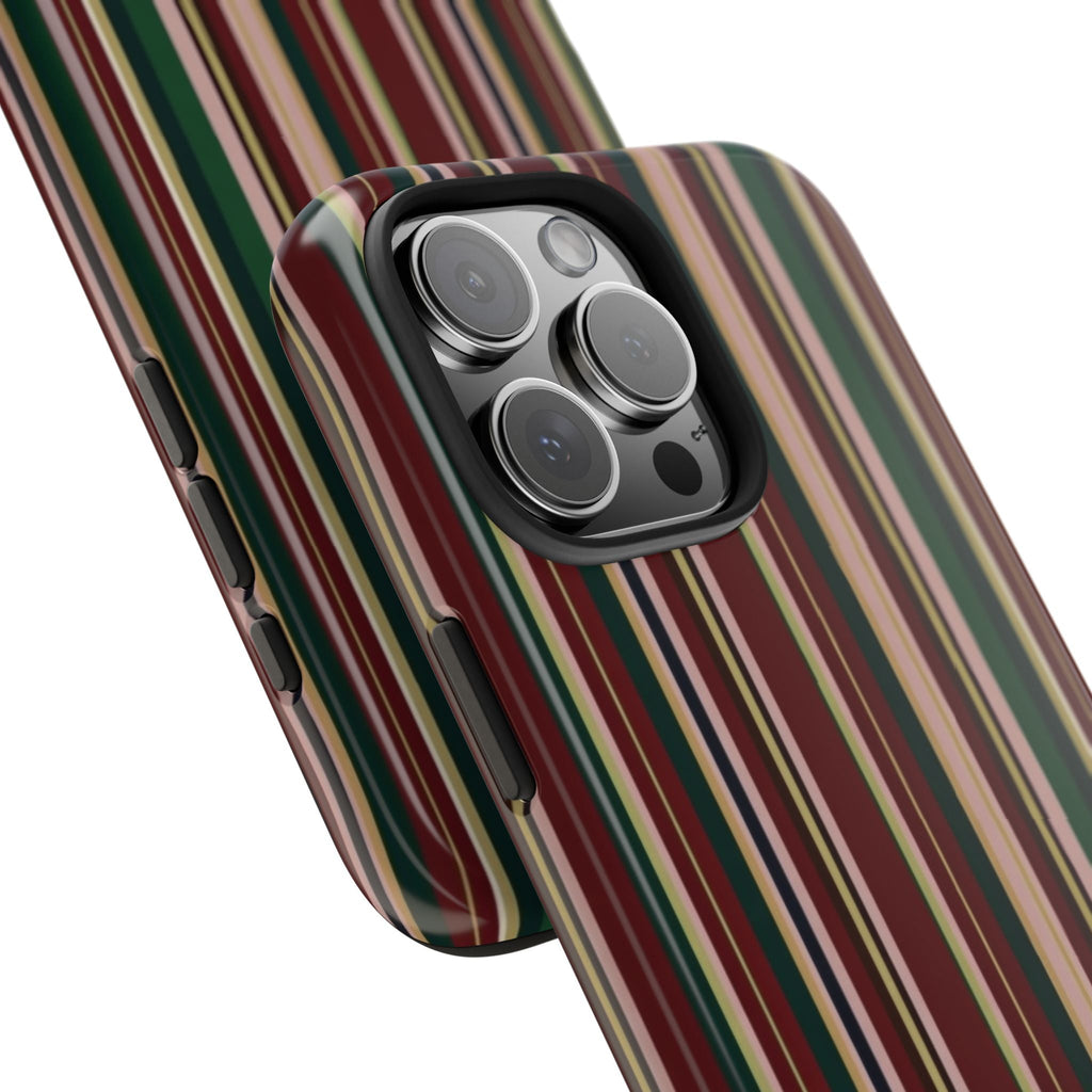 Close-up corner of striped phone case with camera lens openings and dark bezel
