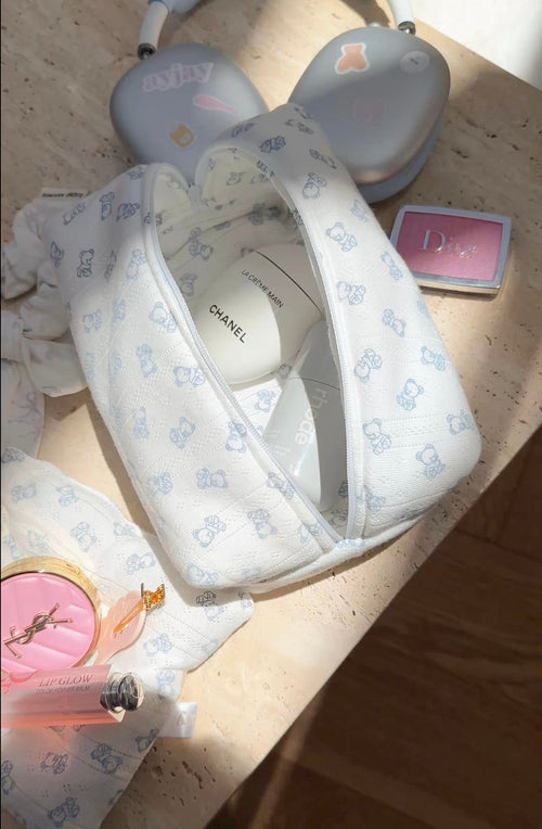 Baby blue bear-print long-sleeve top, zip-front neckline detail