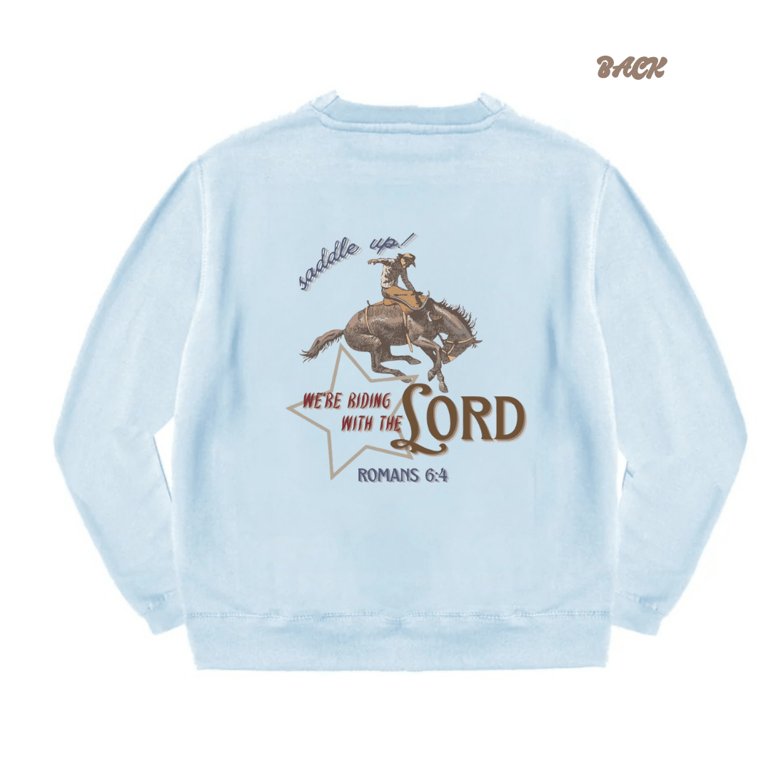Baby blue crewneck sweatshirt with large western rider graphic on front