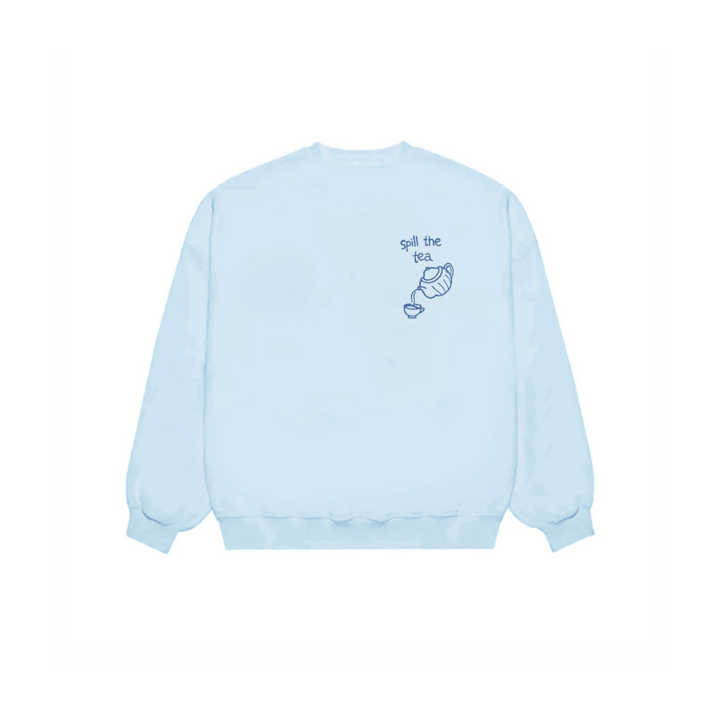 Baby blue crewneck sweatshirt with “Spill the tea” chest graphic