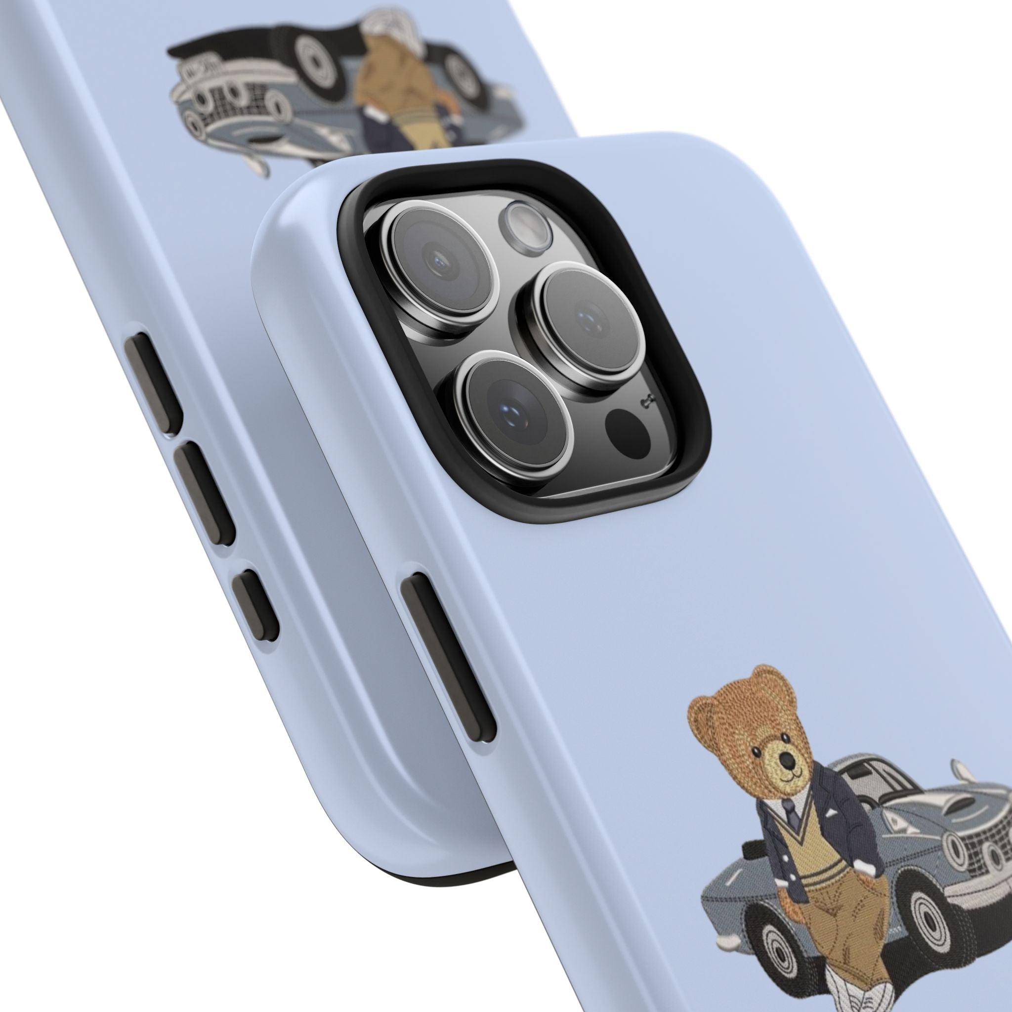 Light blue phone case corner with teddy bear graphic, camera cutout and side buttons